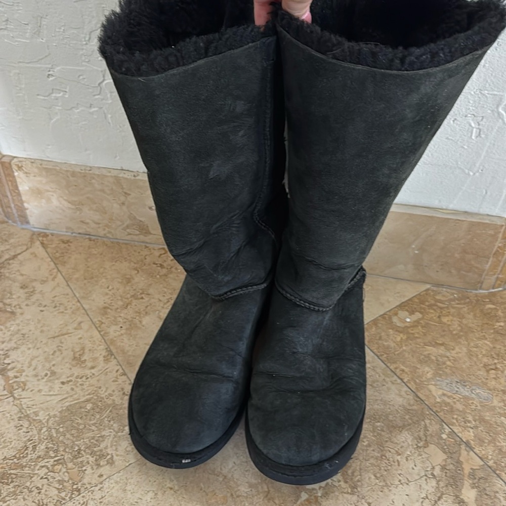 Black Tall UGG boots with bows on back